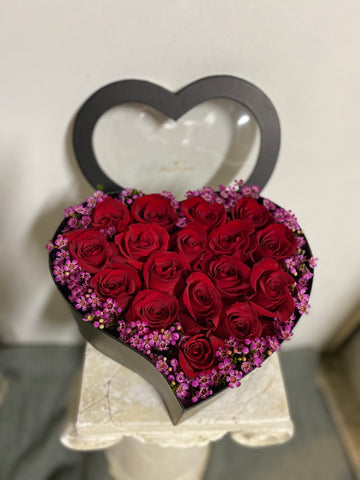 Red  Roses in a heart shaped box to deliver in  Castro Valley ,Hayward, San Lorenzo and San Leandro